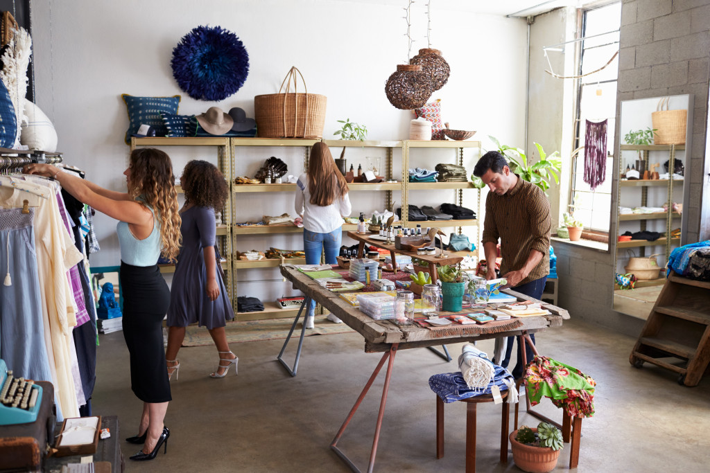 Customers shopping in local boutique